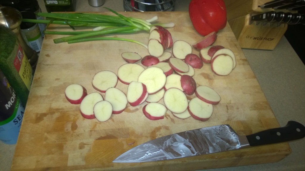 Turn the heat on the high-sided pan when you get done slicing (but not dicing) the potatoes